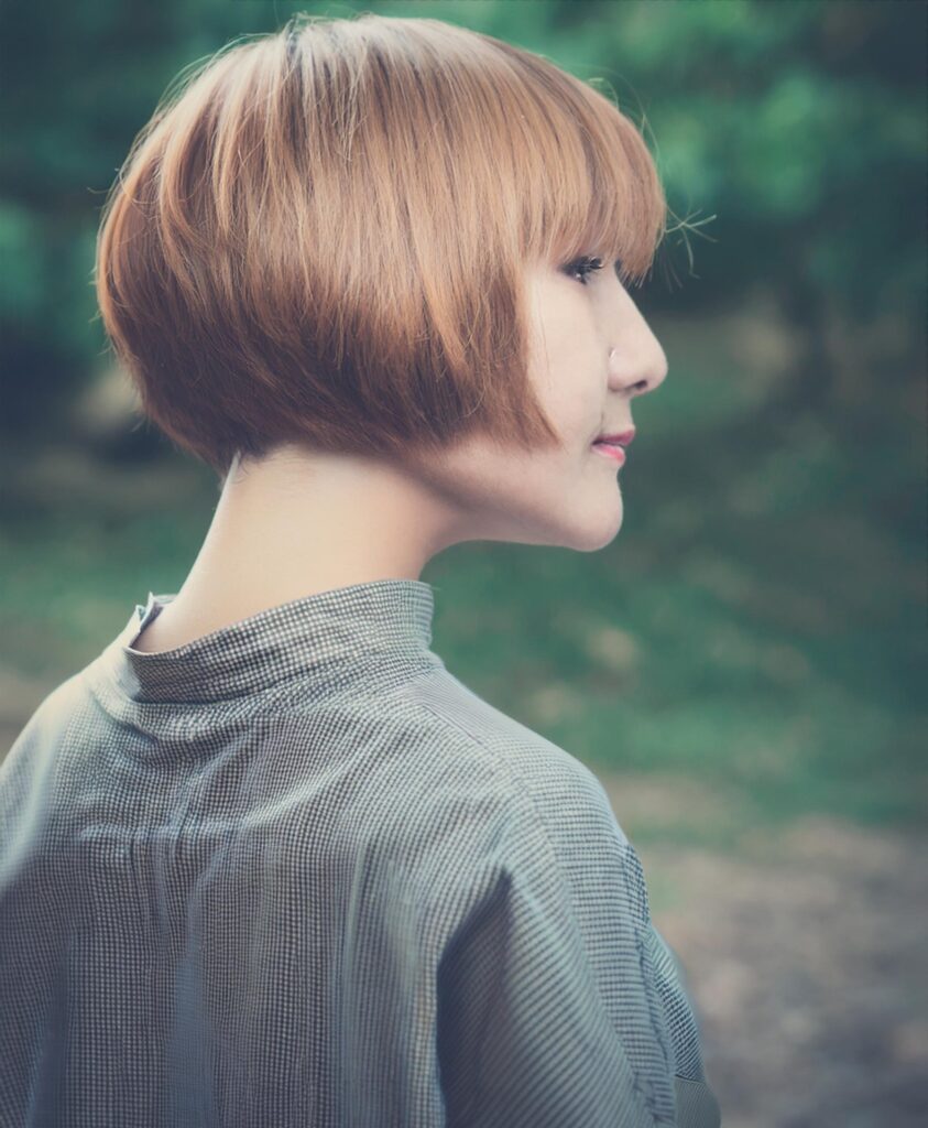 Older women with the asymmetrical Bob hair style