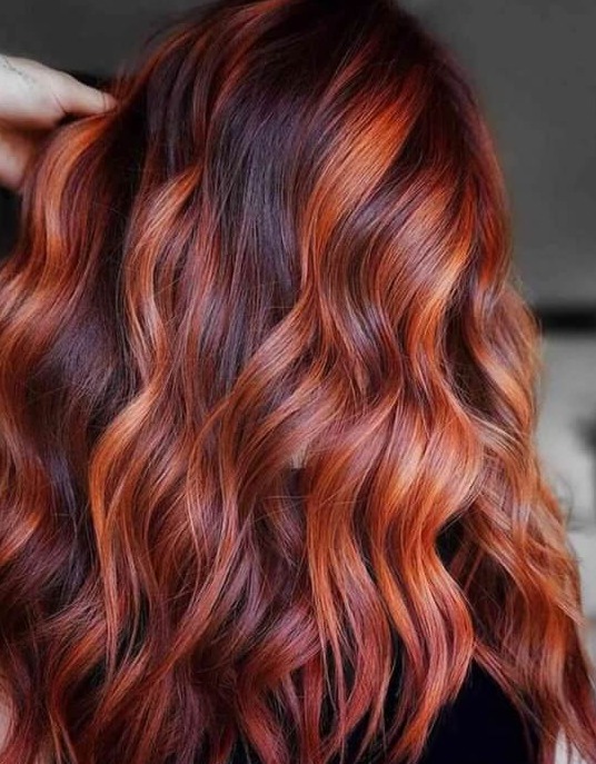 Brown Hair with Red Highlights: A Fiery, Trendy Look