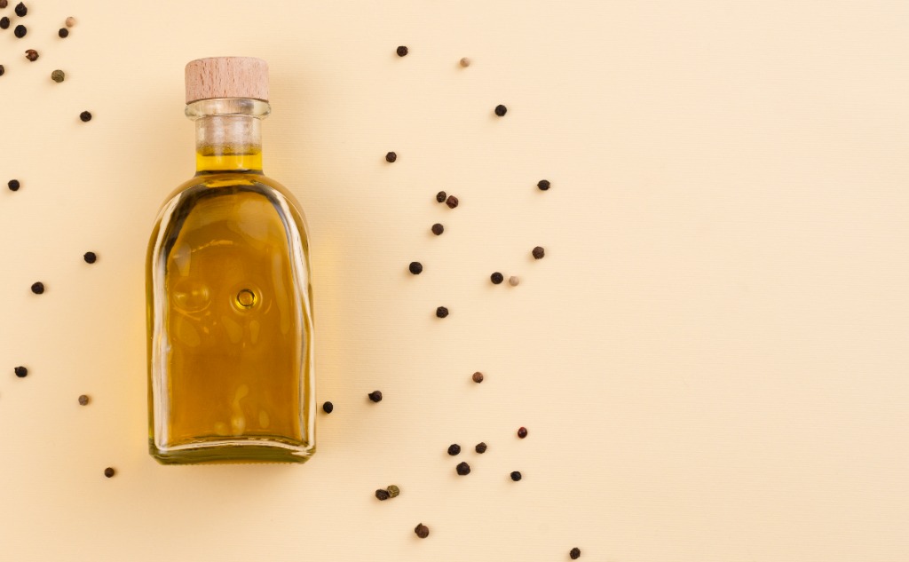 Nourish Your Afro: The Benefits of Sesame Scalp and Hair Oil for Healthy Growth and Moisture