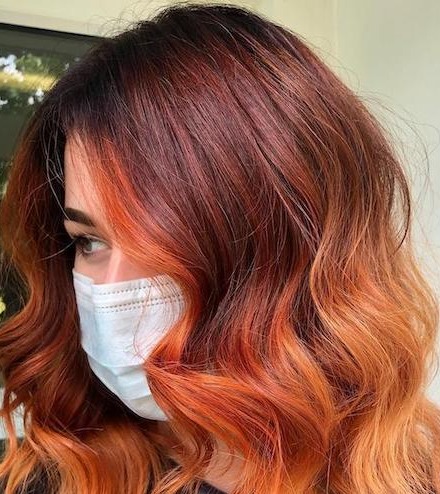 Brown Hair with Red Highlights: A Fiery, Trendy Look